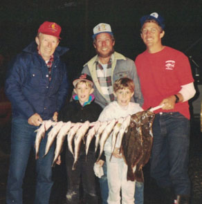   My dad is on the left, and I am the kid who's wearing the sweatpants (It was the 90's).