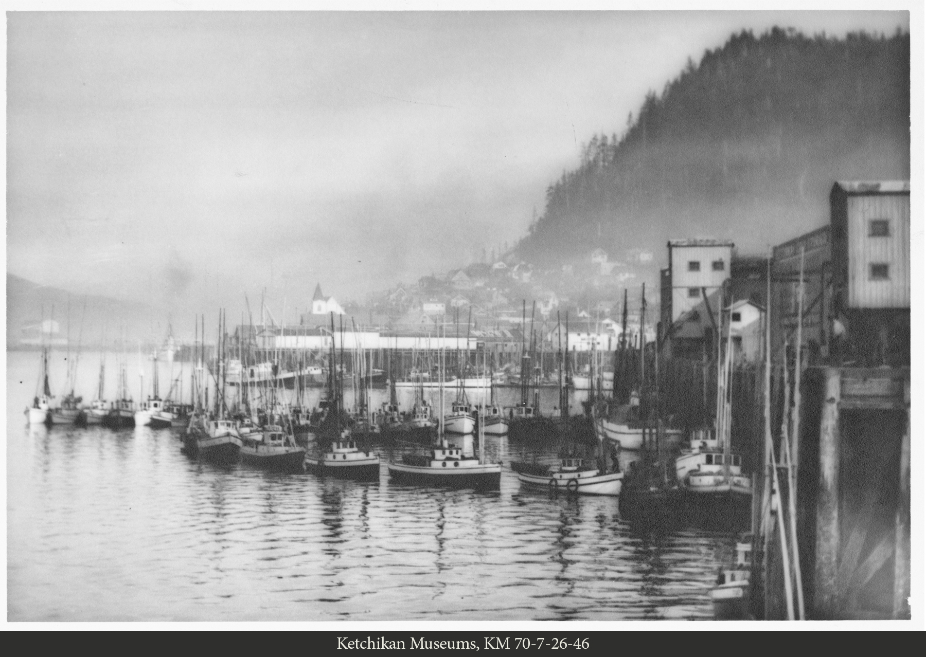 Trollers strung out at the Ketchikan Cold Storage Company dock